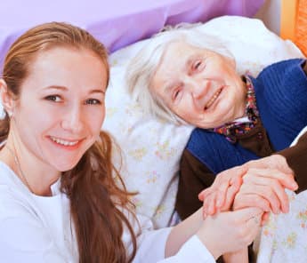 (ROSEWOOD HOME CARE) happy senior woman and her caregiver
